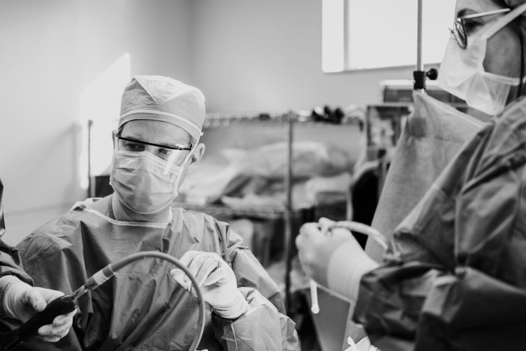 Dr. Donaldson performing a liposuction procedure